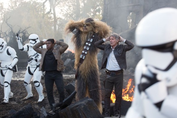 Star Wars: The Force Awakens L to R: Finn (John Boyega), Chewbacca (Peter Mayhew), and Han Solo (Harrison Ford) Ph: David James © 2015 Lucasfilm Ltd. & TM. All Right Reserved.